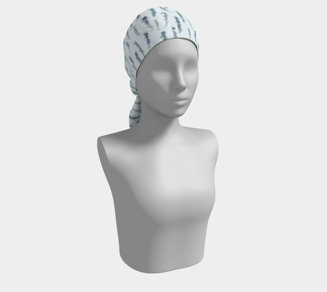 Mannequin wearing a delphinium floral pattern with a light blue background as a headscarf